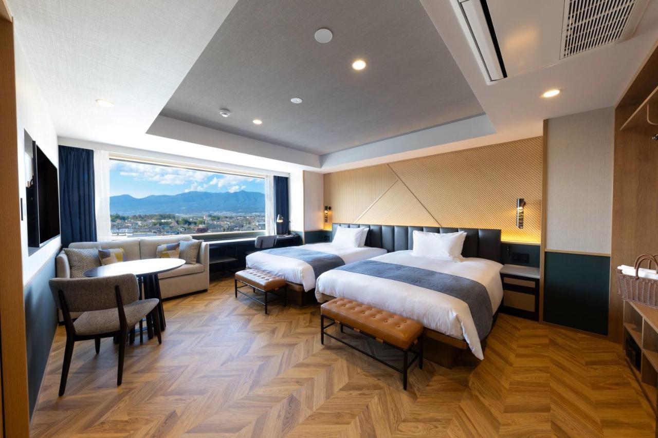 Aqa Hotel Premium Saku Luaran gambar