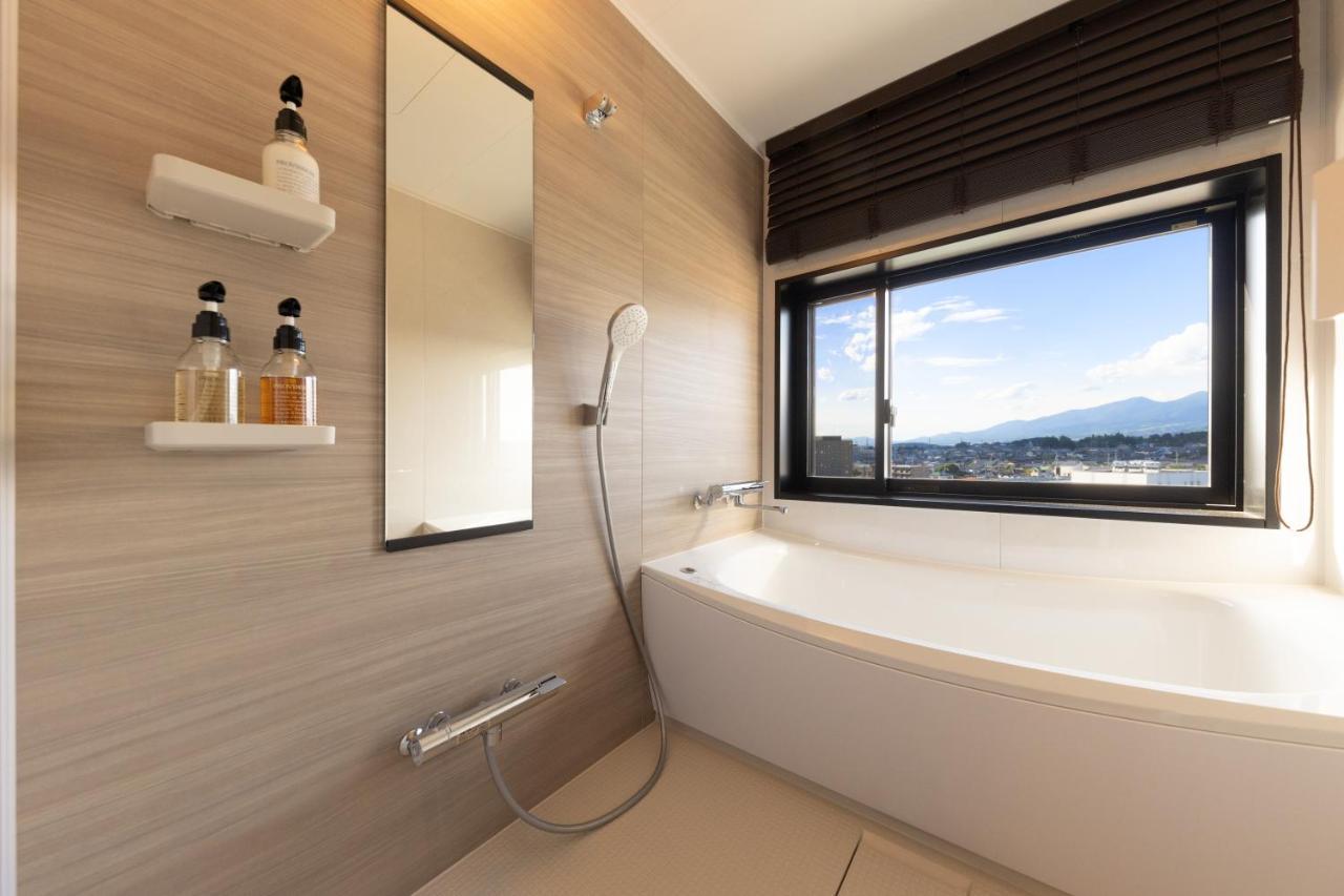 Aqa Hotel Premium Saku Luaran gambar